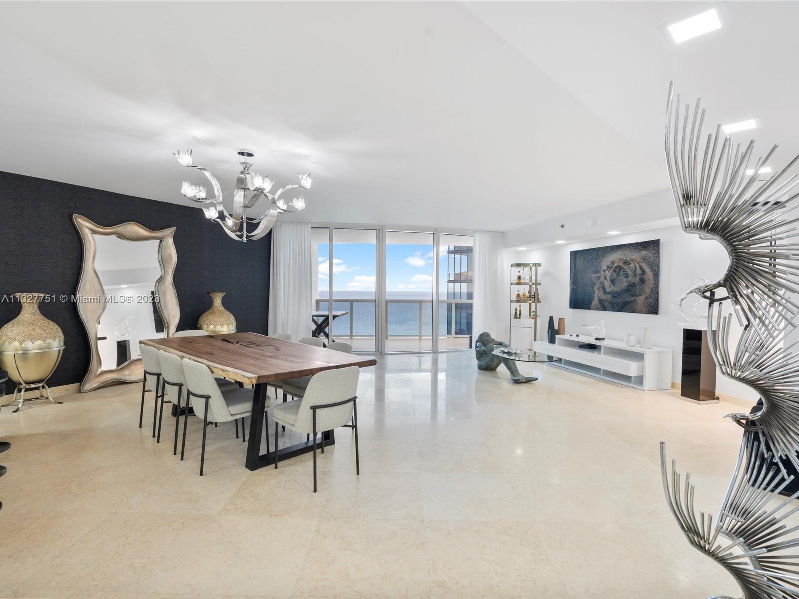 Impeccably updated unit in Sunny Isles Beach Ocean Four Condominium. Enjoy east unobstructed ocean v