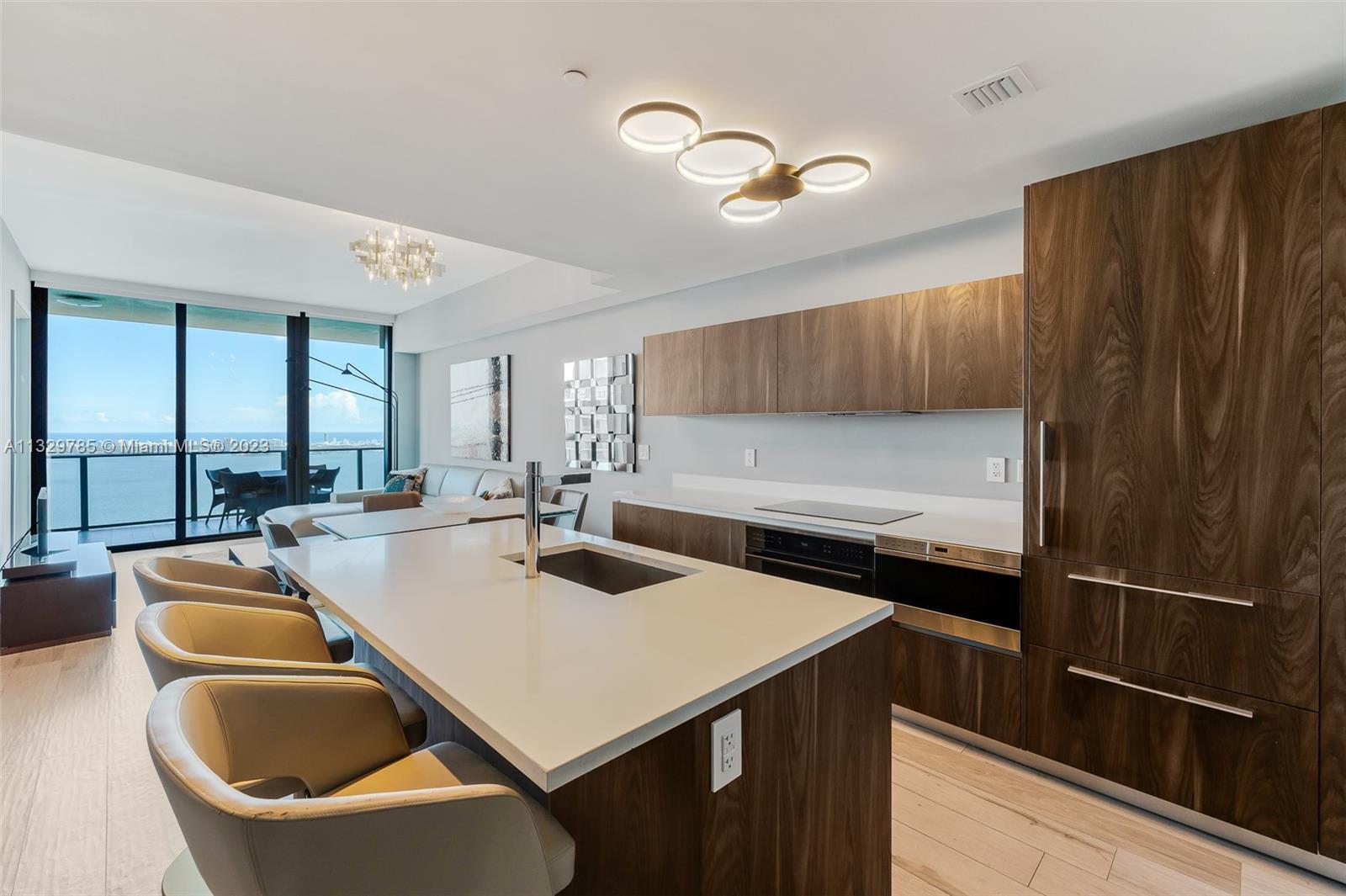 Beautifully finished Gran Paraiso unit with porcelain flooring, custom closets and motorized window 