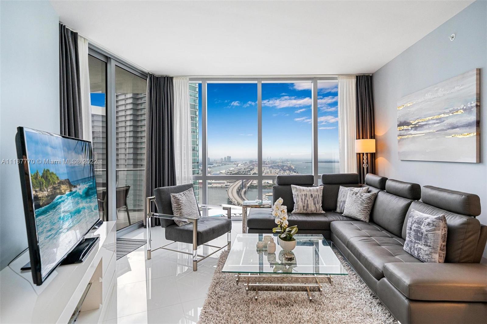 Enjoy the Miami lifestyle from this beautiful 2 bed /3 full bath + den unit with stunning views of t