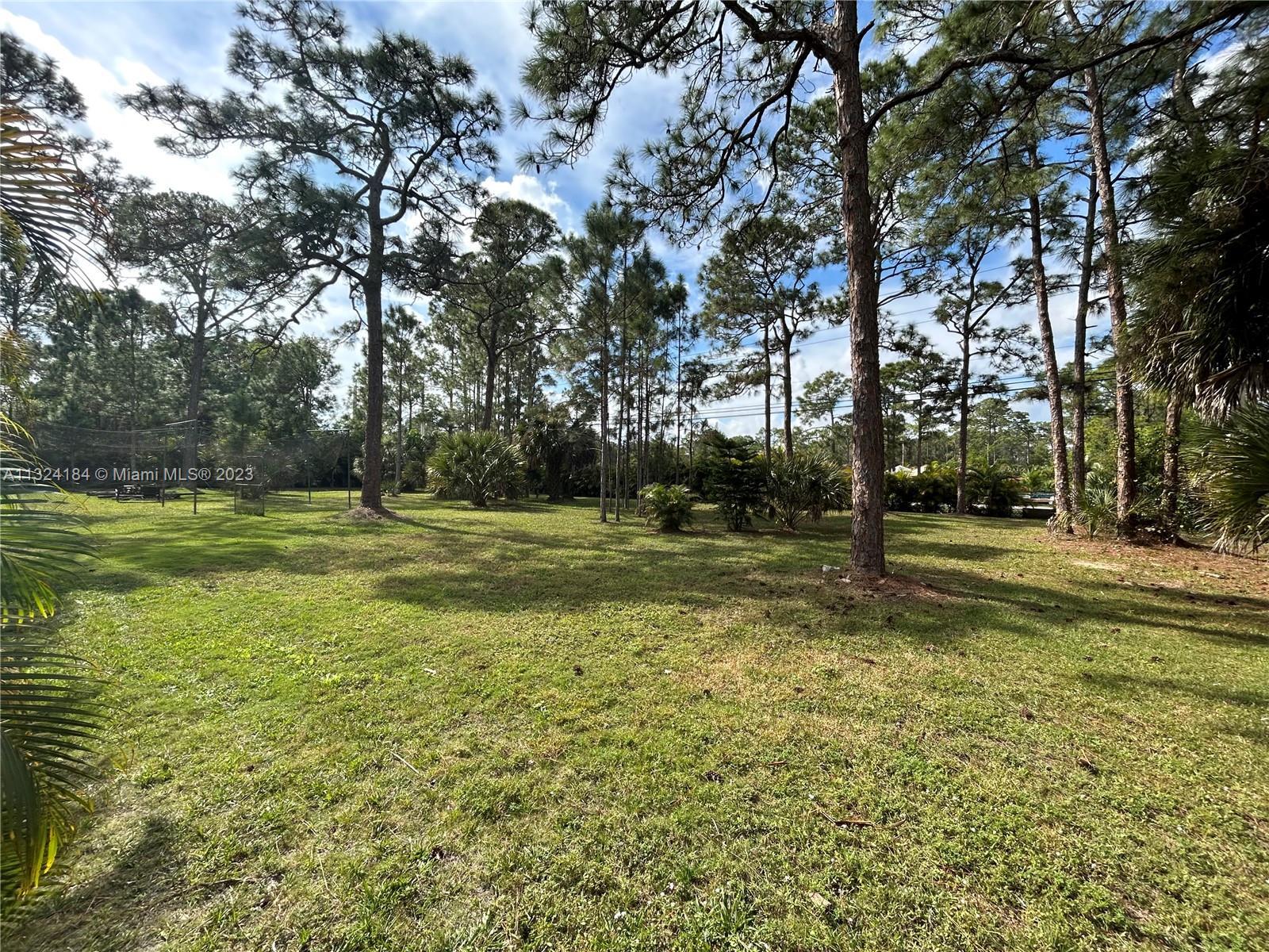 Corner DOUBLE Lot with 2 ACRES Ranch style POOL Home.  Bright 3+ bedrooms with 3+ baths, Vaulted cei