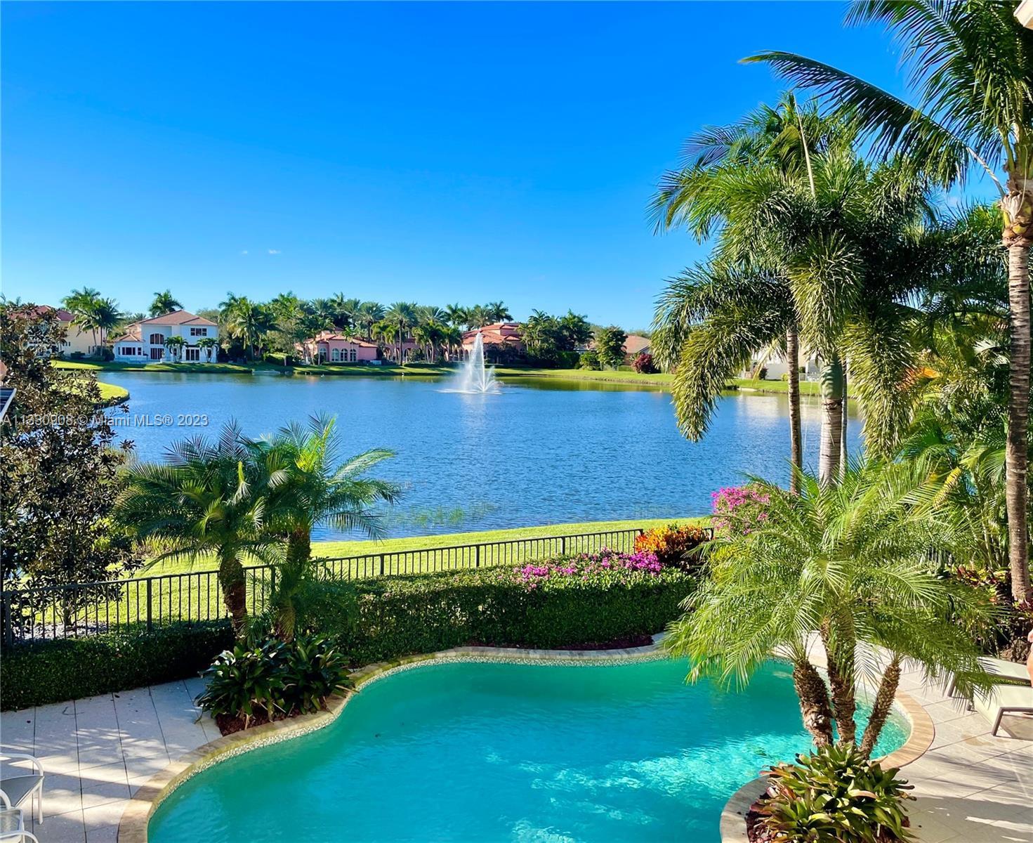 RARELY Available Stunning lakefront Estate in Azura Gate Community located on Millionaire's Row! Thi