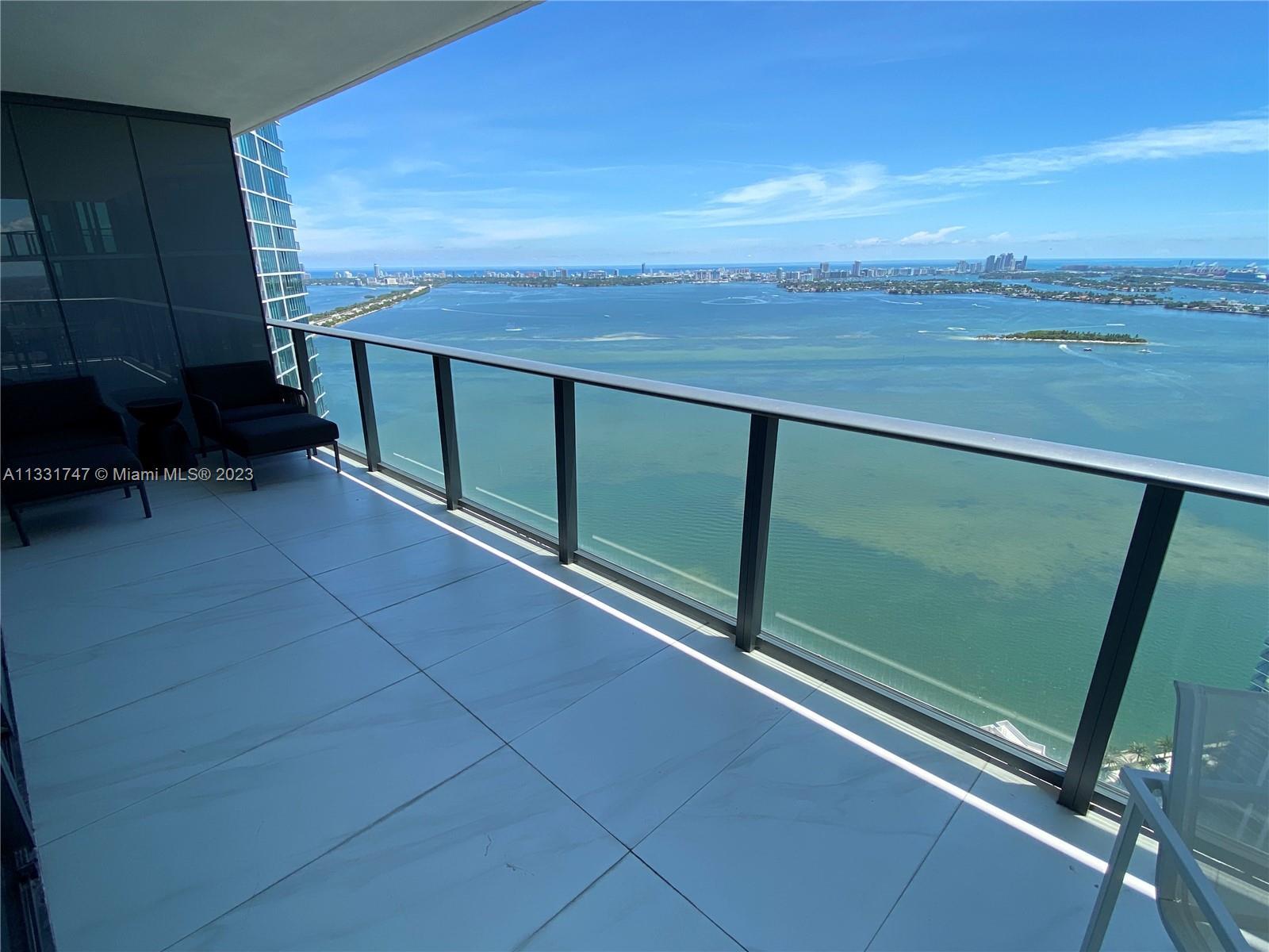 Breathtaking views from the 46th floor, corner unit with east and west views and floor to ceiling wi