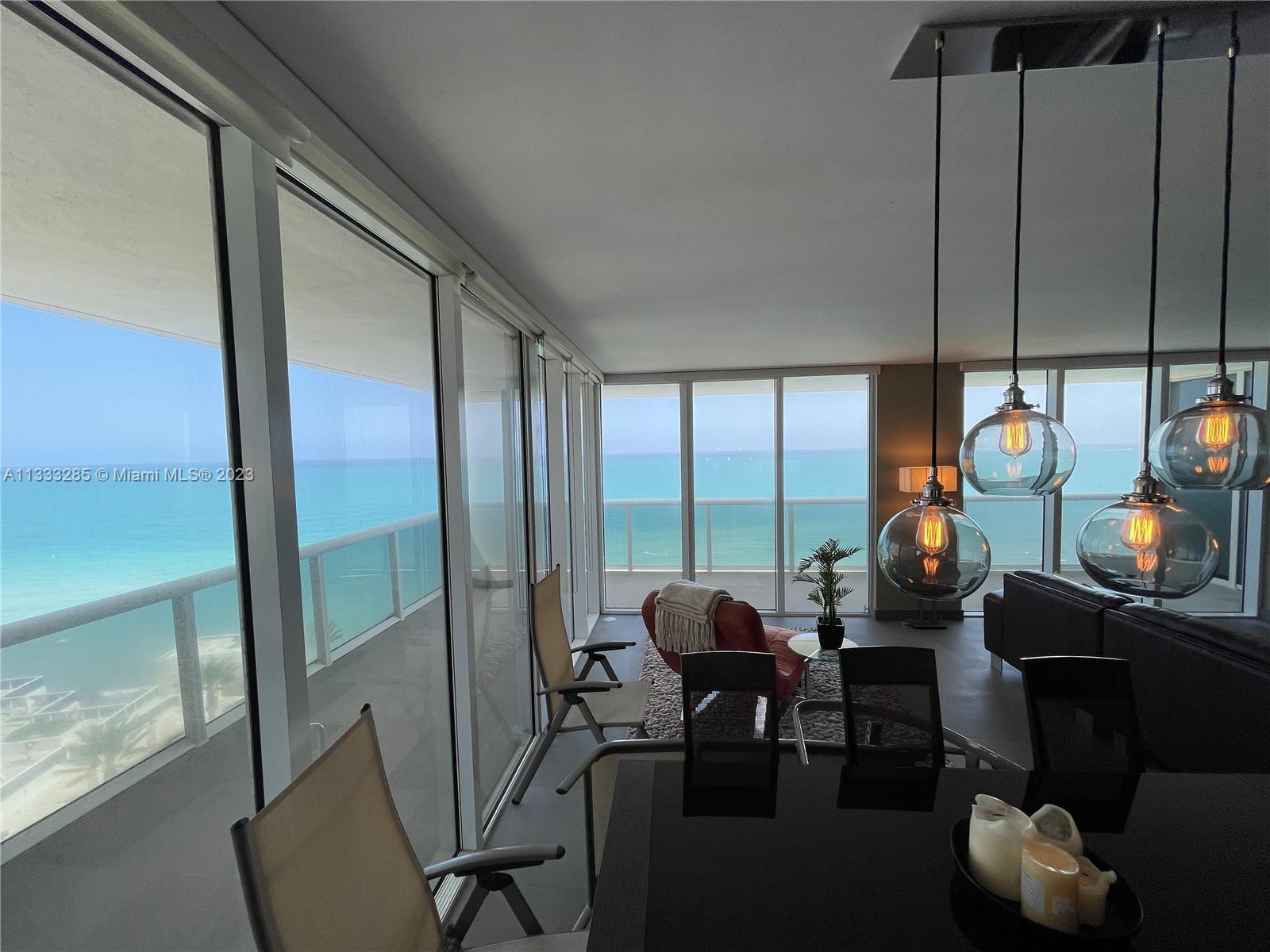 Large corner unit with direct Ocean views. Spacious 3 Bed / 3.5 Bath with oversized terrace, grey ce