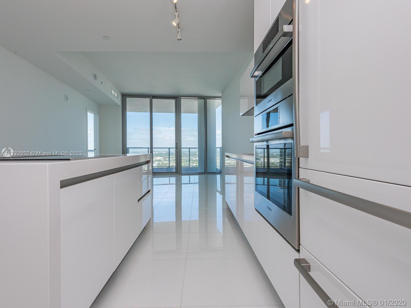 Welcome to Paramount Miami World Center - Large 1 Bed/2 full bath +Den with all white kitchen in the
