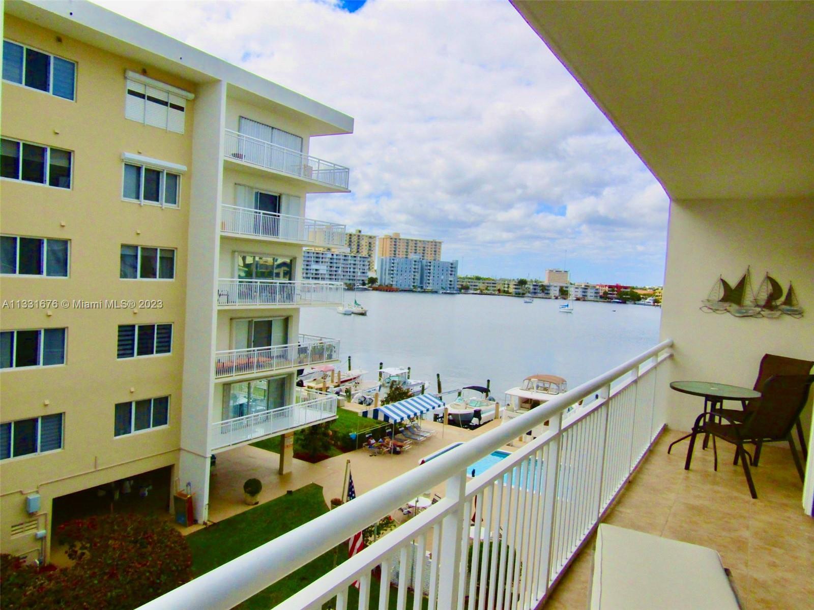 Impeccable corner unit with an amazing Panoramic water view from a wrap around balcony overlooking w