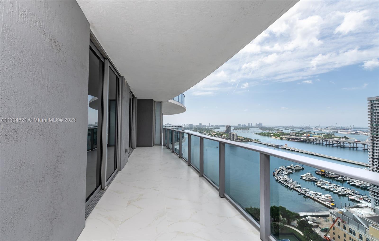 BRIGHT AND SUPER SPACIOUS 3 BED, 3 1/2 BATH UNIT WITH BREATHTAKING VIEWS TO BISCAYNE BAY AT LUXURIOU