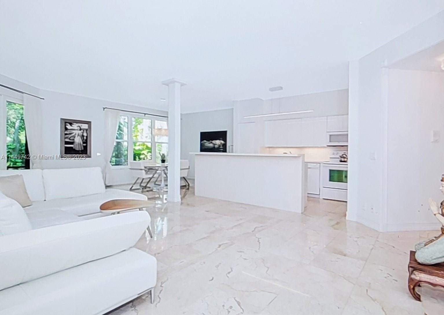 Stunning and Bright 3 bdrm. 2 bath, Contemporary Chic design Coach Home in one of Boca's finest desi