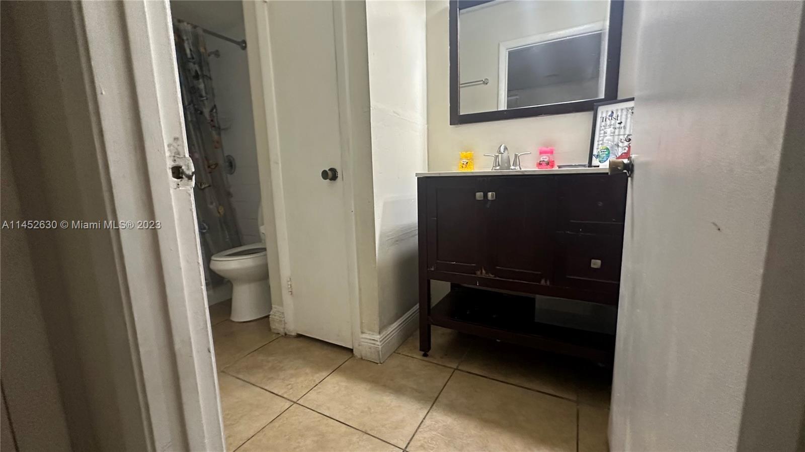 Tiled throughout the unit,new kitchen, new bathrooms, renovated, stainless steel appliances. Washer 