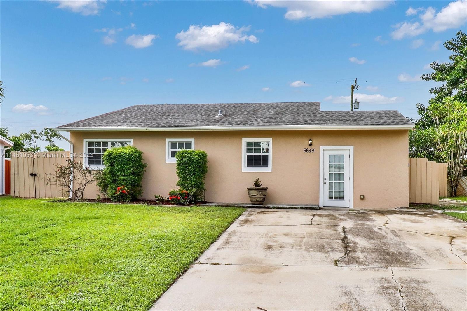 Welcome to this 3 bed, 2 bath home with a large covered back patio. The primary bedroom has a privat