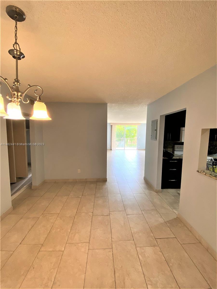 Photo of 1465 NE 123rd St #302 in North Miami, FL