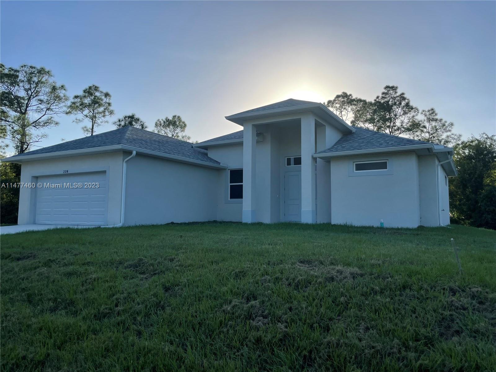 Photo of 328 Lillon Ave S in Lehigh Acres, FL