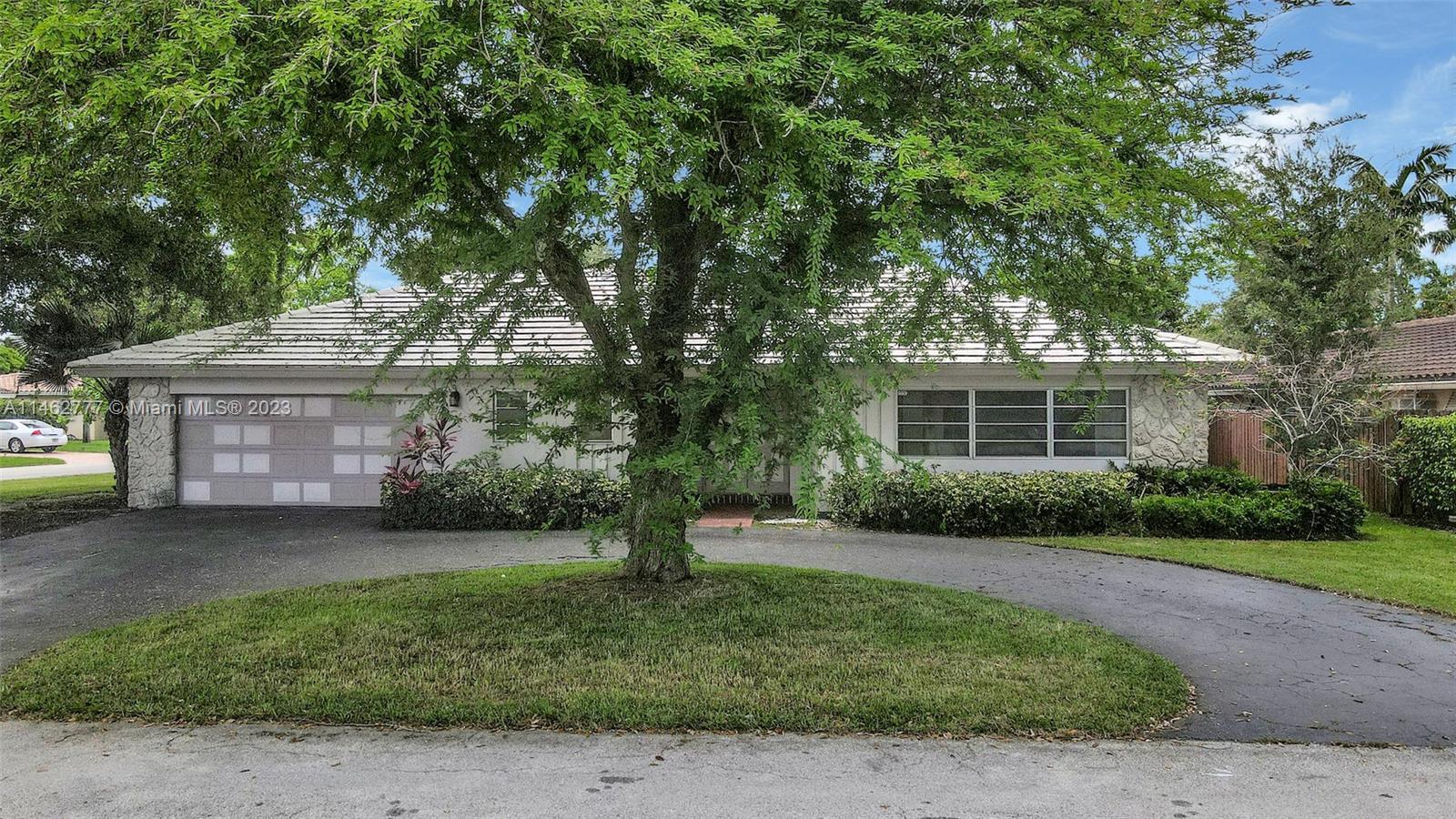 This spacious oversized corner lot in Boca's Lake Floresta neighborhood on the East side is ideal fo