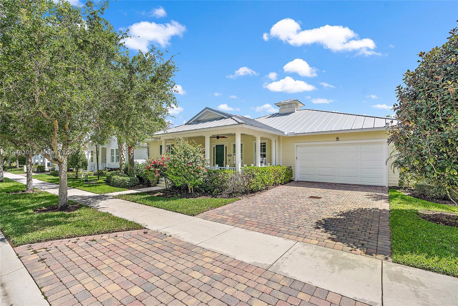 Welcome home to Mallory Creek, one of Jupiter's most highly sought after communities! This sophistic