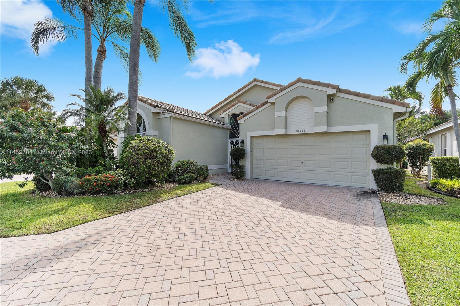 Walk into this Open & Spacious home, with soaring ceilings, in this beautiful well-maintained 55+ co