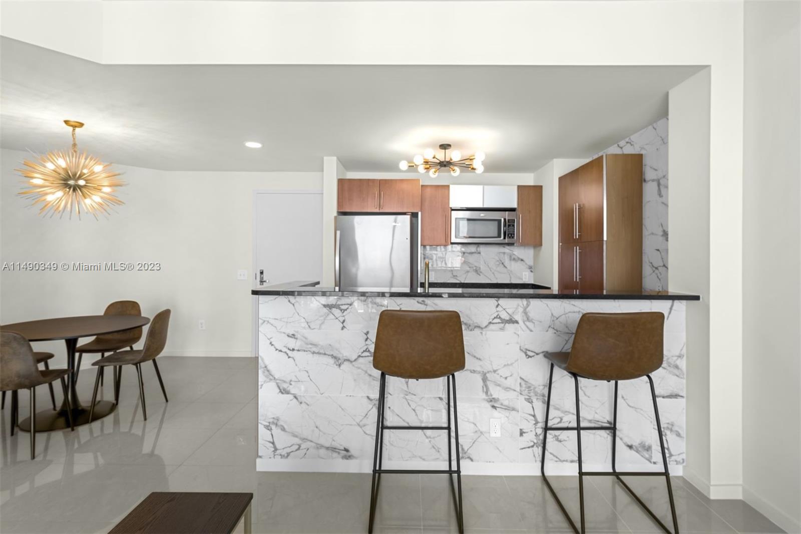 Beautifully furnished 1-bedroom, 1.5-bathroom at Met 1. Inside, find a harmonious blend of comfort a