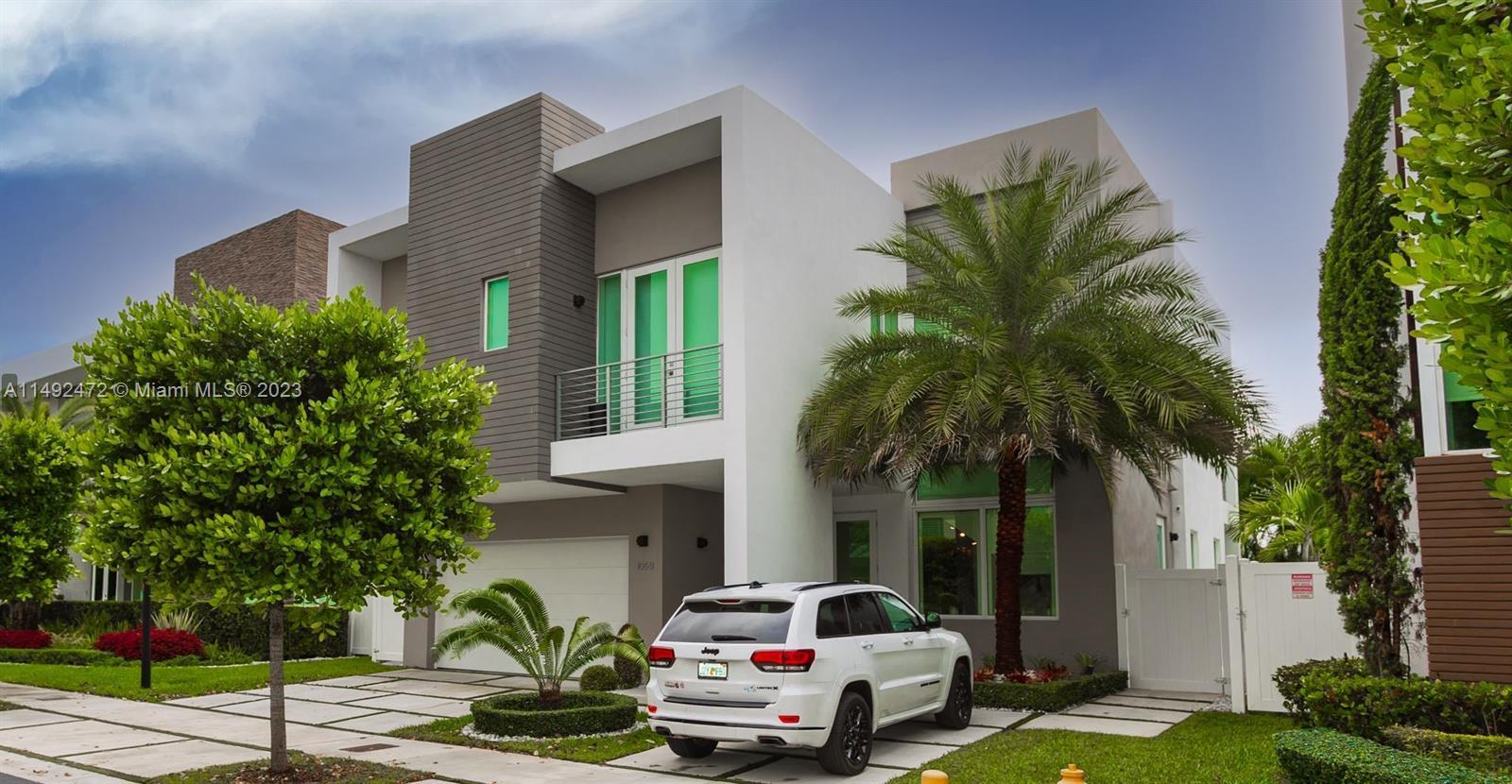 Nestled in the heart of Doral's most prestigious and contemporary neighborhood this exquisite home e