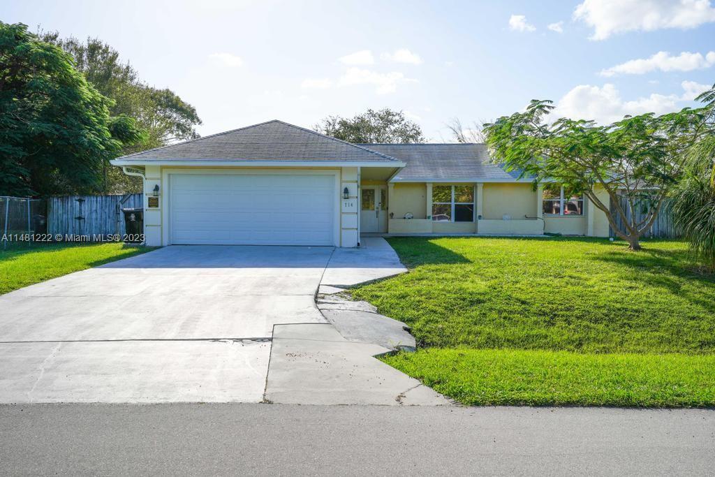 Photo of 714 NE Lanfair St in Port St Lucie, FL