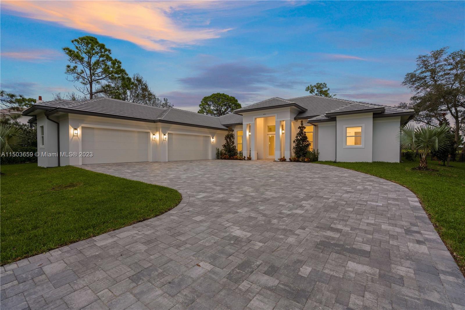 STUNNING new construction golf course home in Jupiter's desirable Old Trail community, within Ranch 