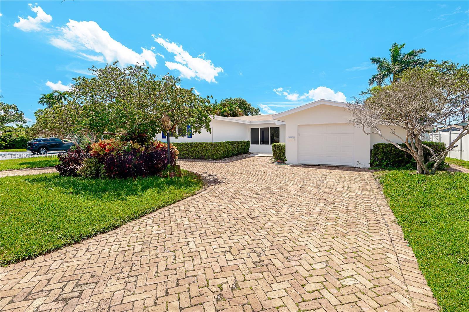 Located within the prestigious enclave of Lighthouse Point, meticulously remodeled with permits, 4 b