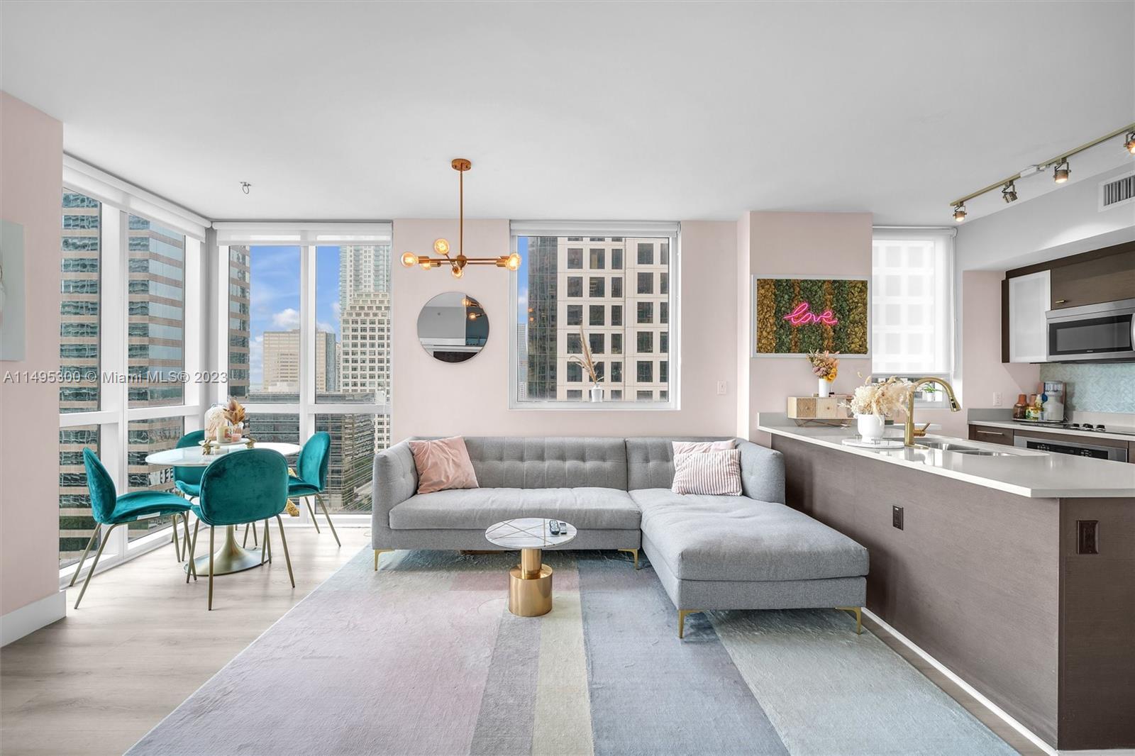 This exquisite 2BR/2B corner unit in 500 Brickell E is a true gem, offering unparalleled features an