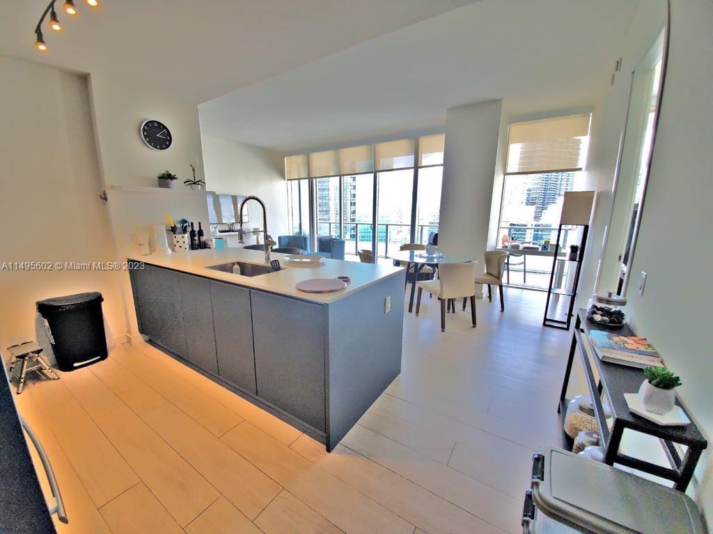 Fantastic 1 Bedroom + Den located by Biscayne Bay and walking distance to all the action in Brickell