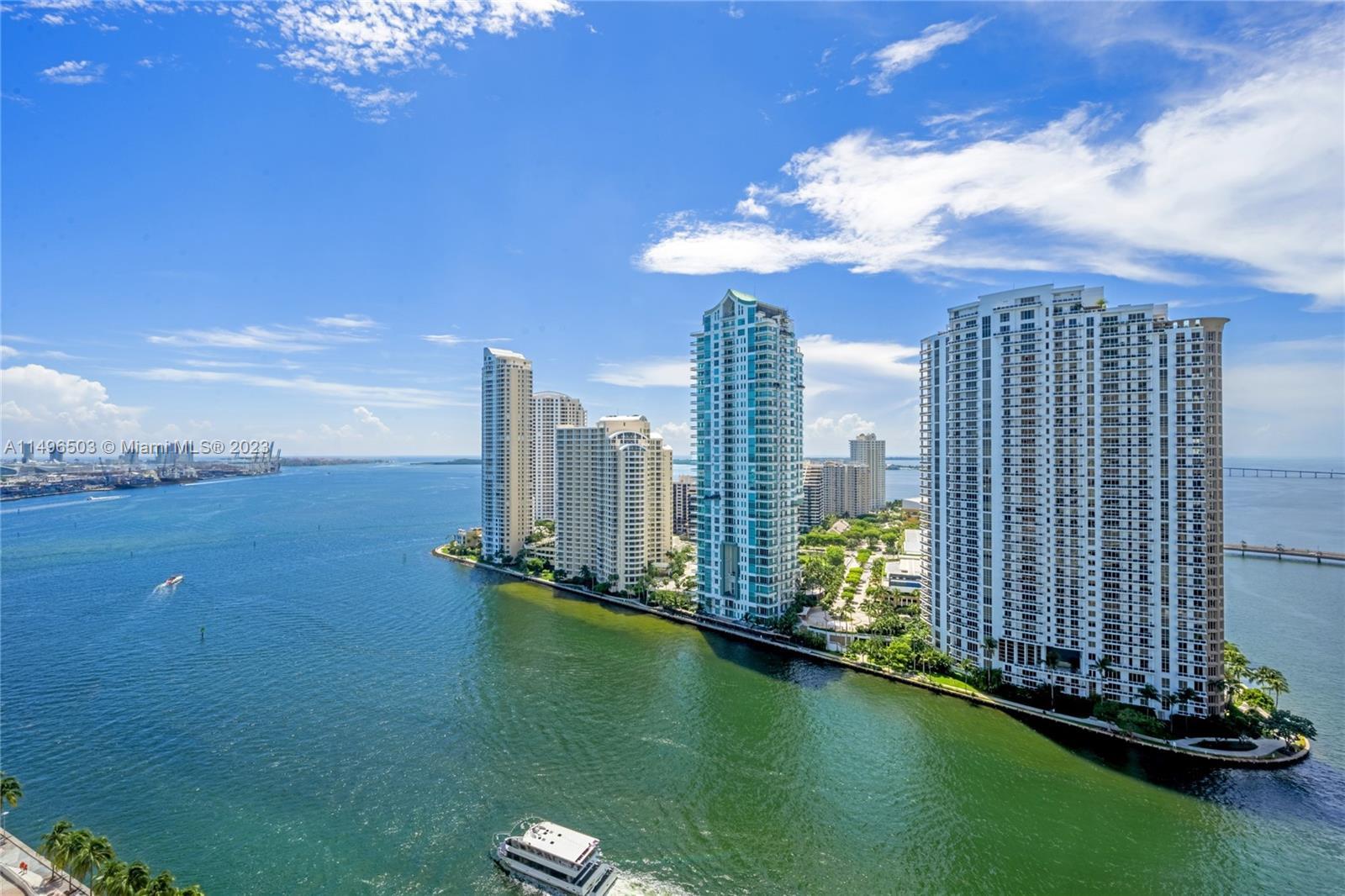 Beautiful 2/2 split bedroom plan unit with amazing direct Bay view. Marble floors throughout, Italia