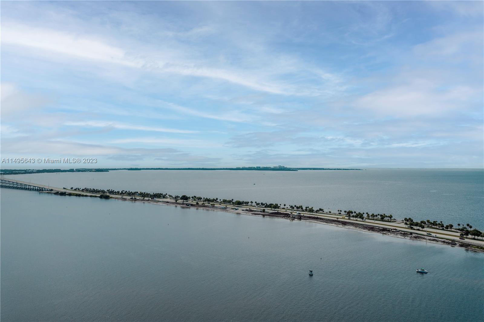 Breathtaking views of the ocean, Biscayne Bay, and city from this Brickell Avenue Penthouse in the s
