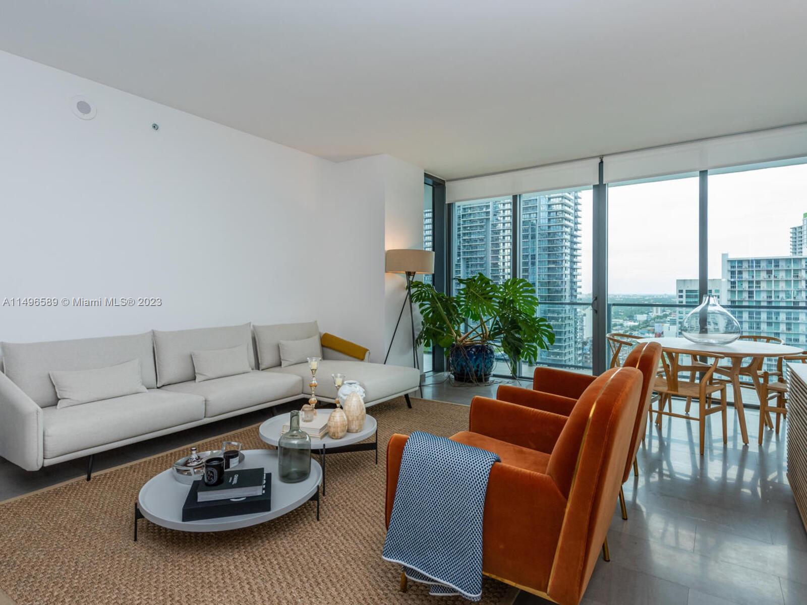 Nestled in the sought-after Reach at the Brickell City Center, this contemporary unfurnished unit fe