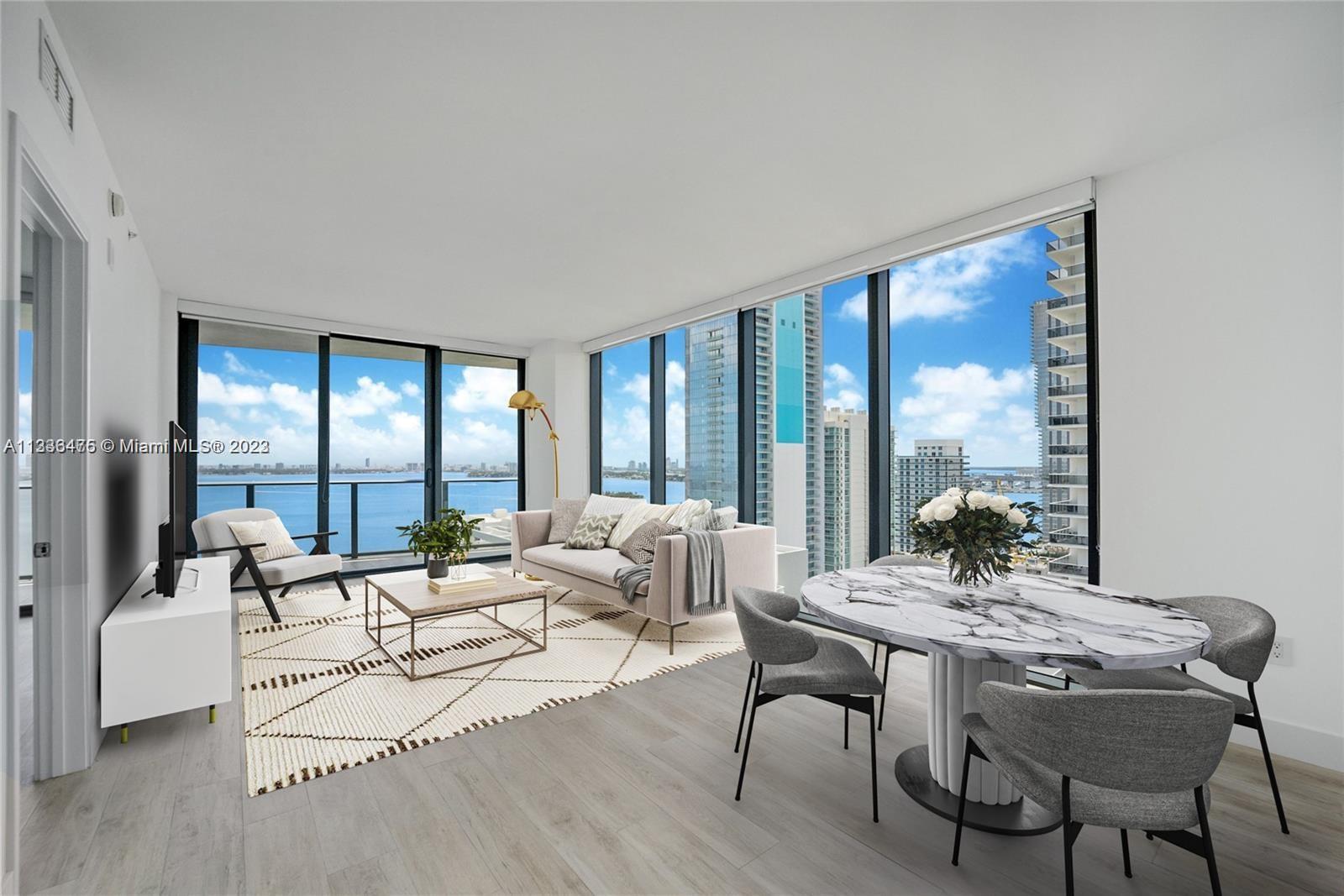 Exceptional corner unit with breathtaking unobstructed views of the Miami Bay. Desirable 3 beds, 2.5