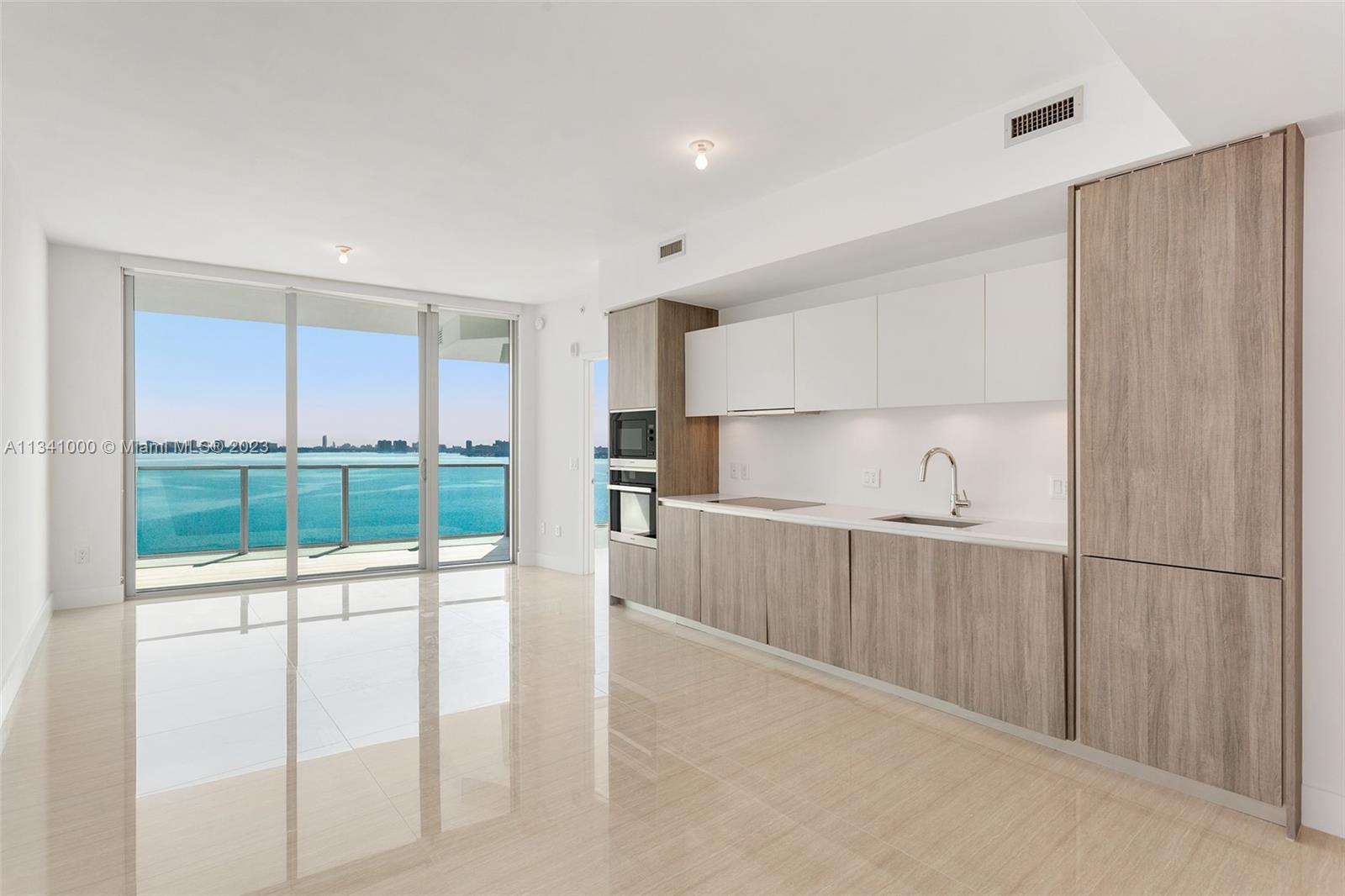 Beautiful 2 bedroom 2 bath residence in Biscayne Beach Condo. Features high ceilings, floor-to-ceili