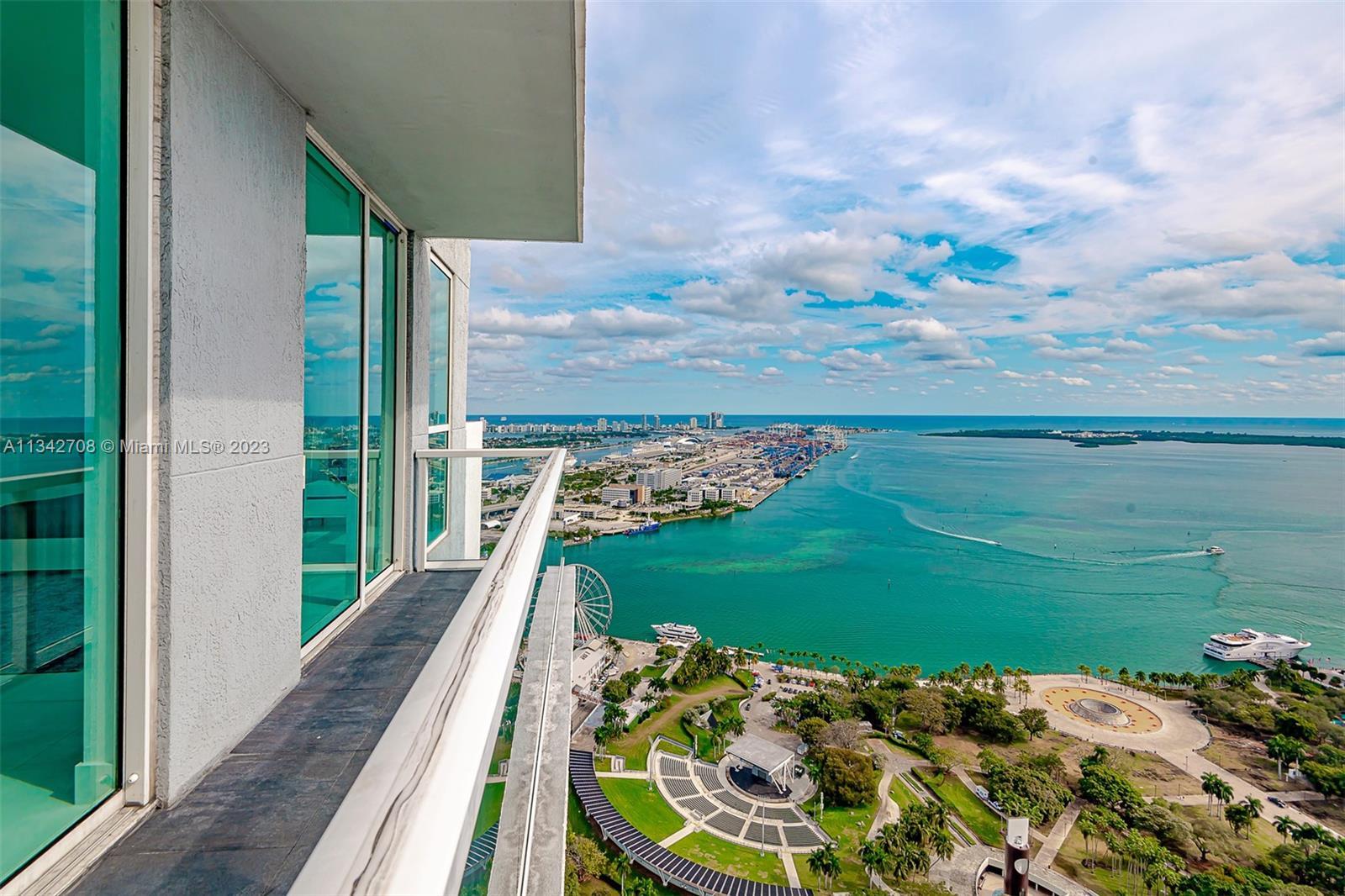 Opulent 3 bed/4.5 bath three story Upper Penthouse with miles of wide open bay, ocean and city views
