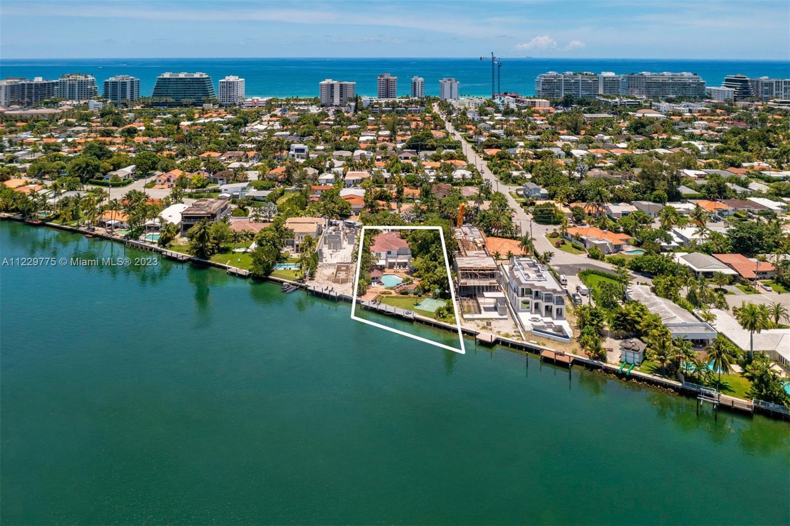 Largest waterfront lot available in all of Surfside. Live in coveted Surfside on this gorgeous water
