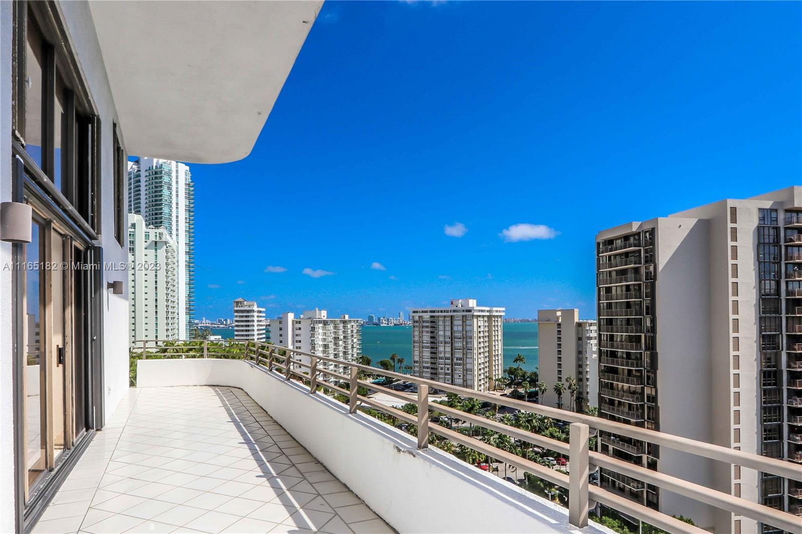 It's all about the views. This 4/4.5 townhouse is located on the 15th floor with 20 ft ceilings as y