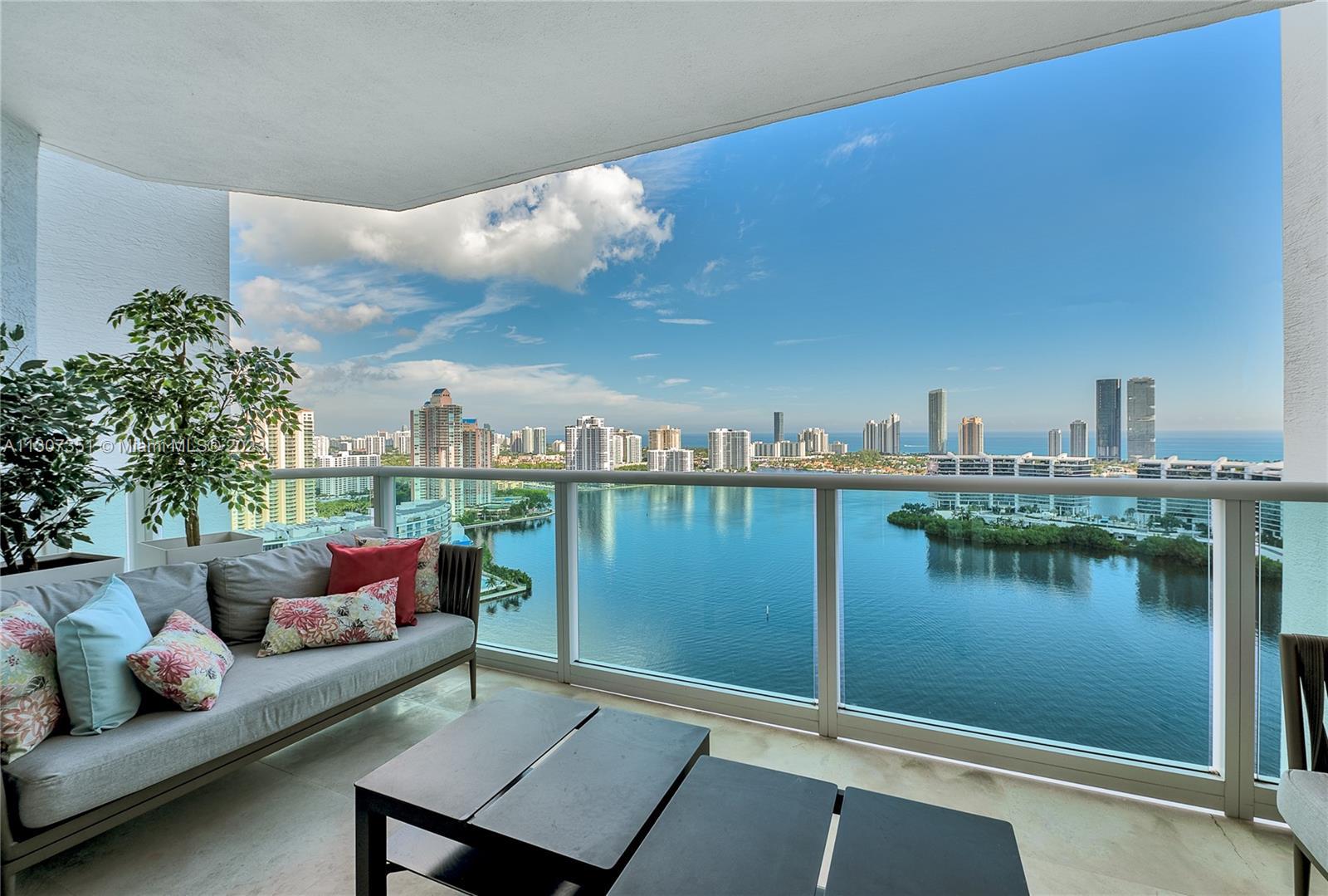 Location Location!  Stunning views in luxurious The Peninsula II Condo,  This lower PH is one of the
