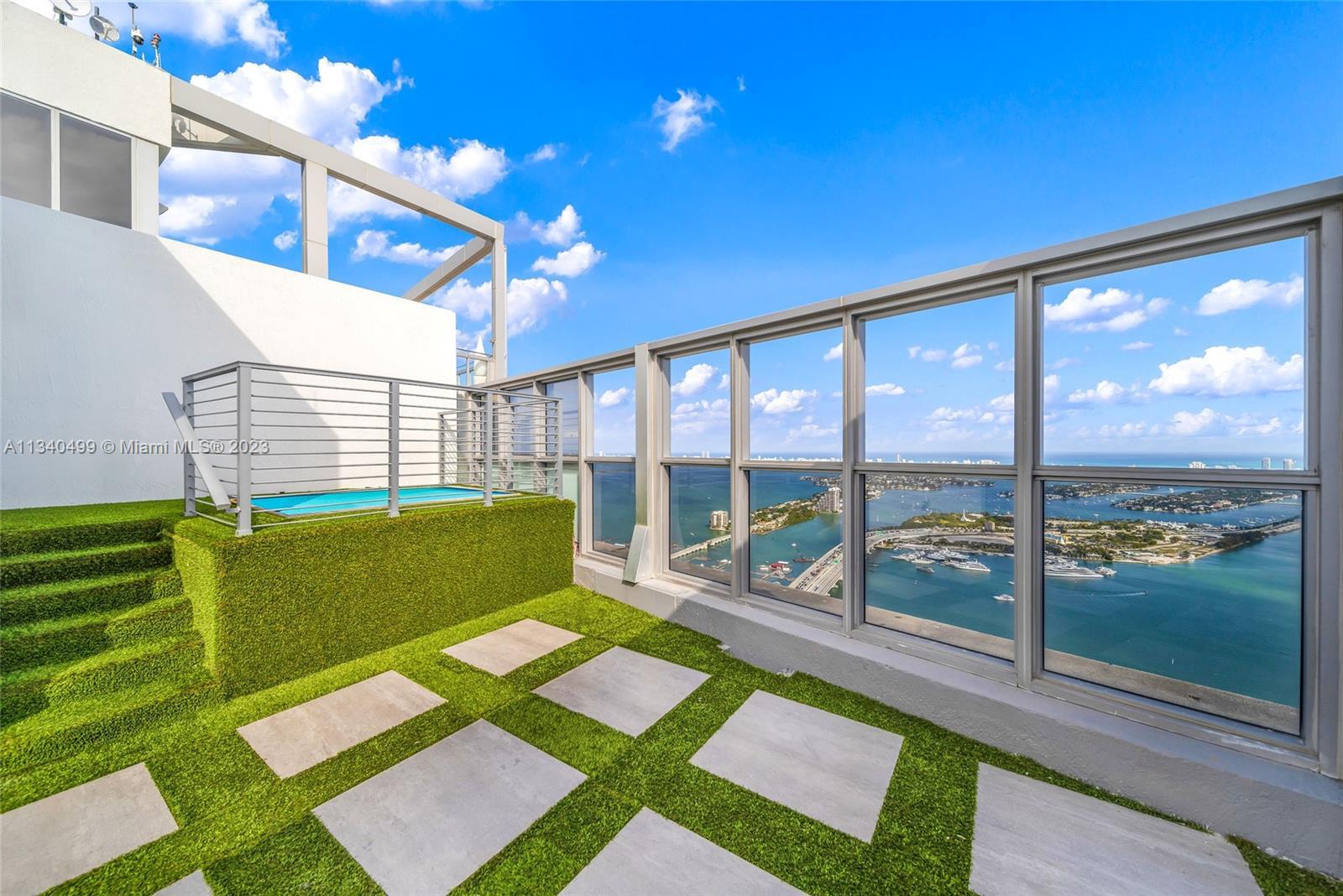 This stunning tri-level, 3 bedrooms /  2.5 baths PH in iconic Marquis is the ultimate Miami house in