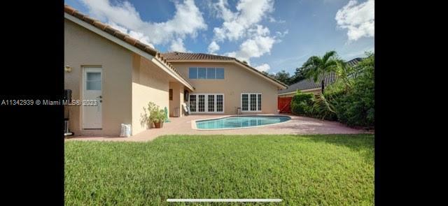 Photo of 10240 SW 13th St in Pembroke Pines, FL