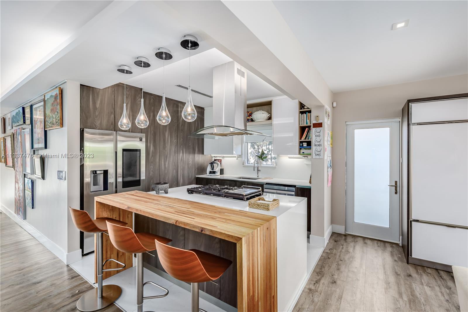 GORGEOUS residence on the best street in highly sought-after SURFSIDE. Meticulously renovated with i