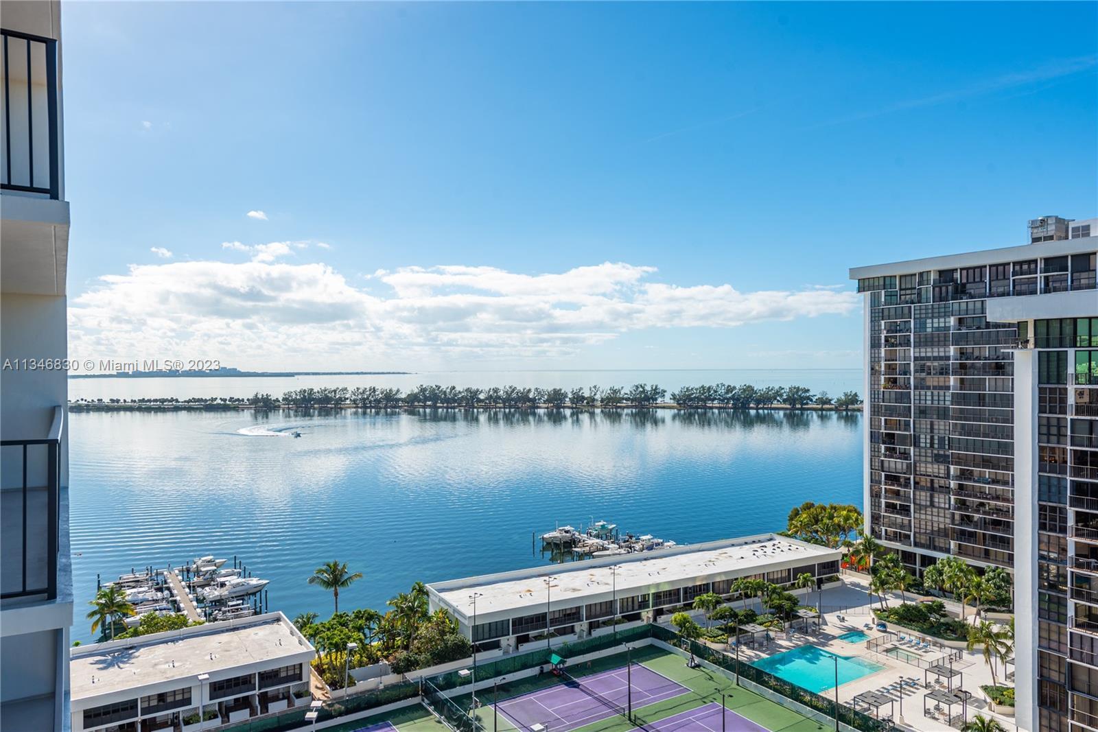 Breathtaking water views from this newly remodeled 1/1.5 unit at Brickell Place Phase I. Bright and 