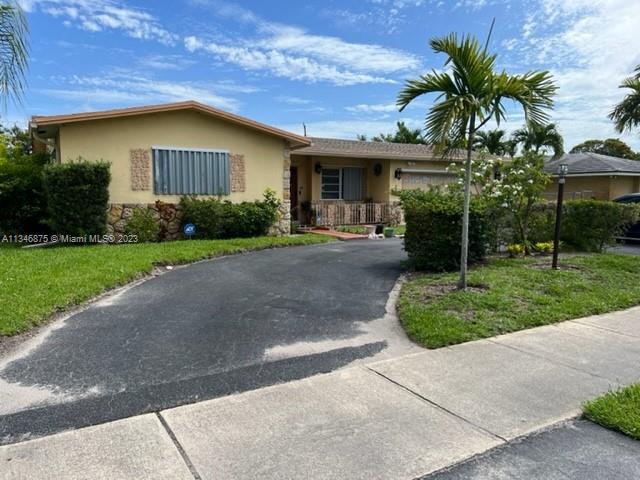 WELCOME TO MILLIONAIRE MILE in Pompano Beach. Square footage is 2,453 on over 1/3 of an acre with a 