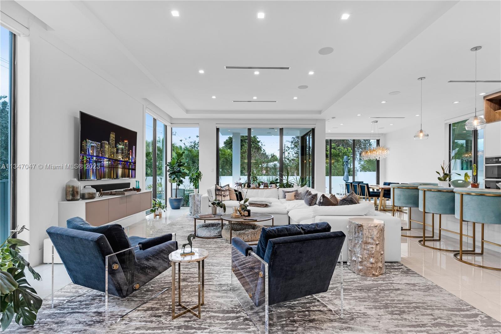 Elegant light-filled modern, Rio Vista Crestron Sonos smart home by award winning Randall Stofft Arc