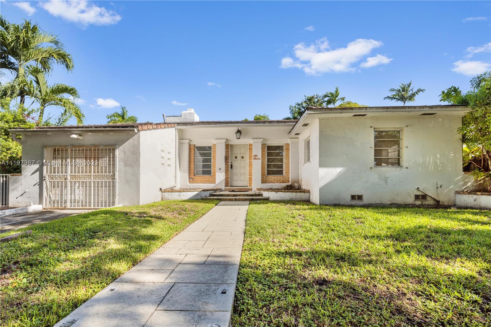 AMAZING OPPORTUNITY WITH THIS BLANK CANVAS NESTLED IN THE DESIRED HISTORIC MORNINGSIDE GATED COMMUNI