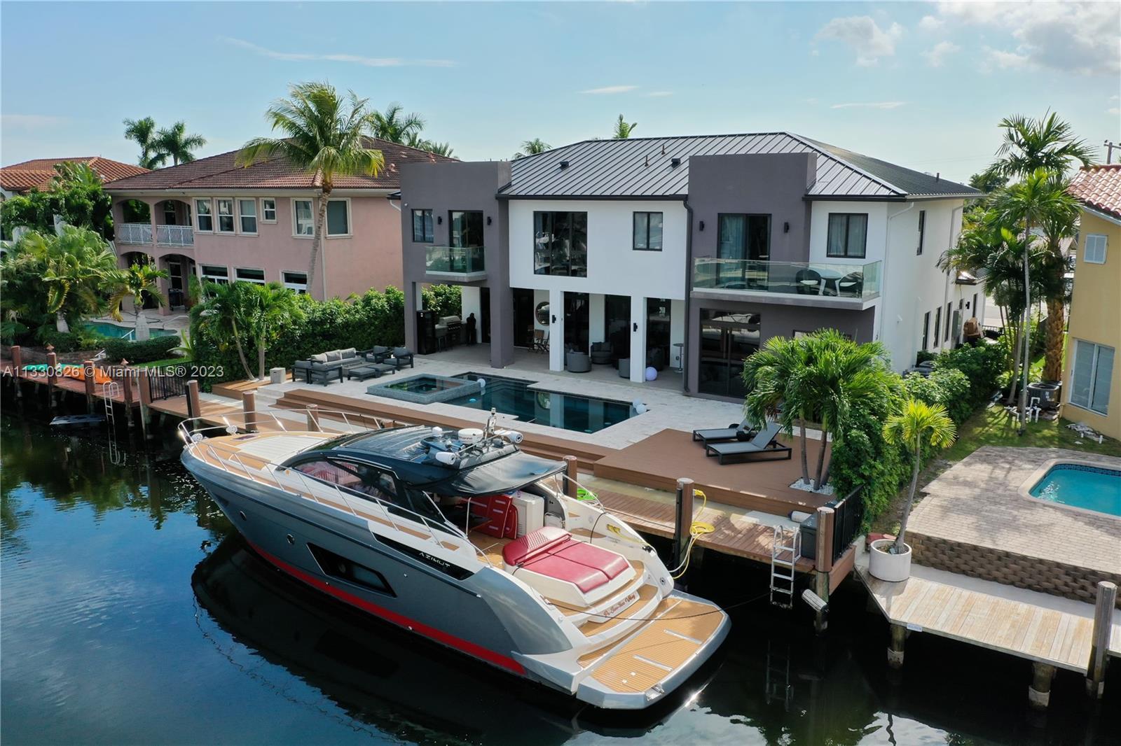 BOATERS LOVERS! 80ft waterfront w/ ocean access, NO FIXED BRIDGES. Absolutely spectacular 5-bed/6-ba