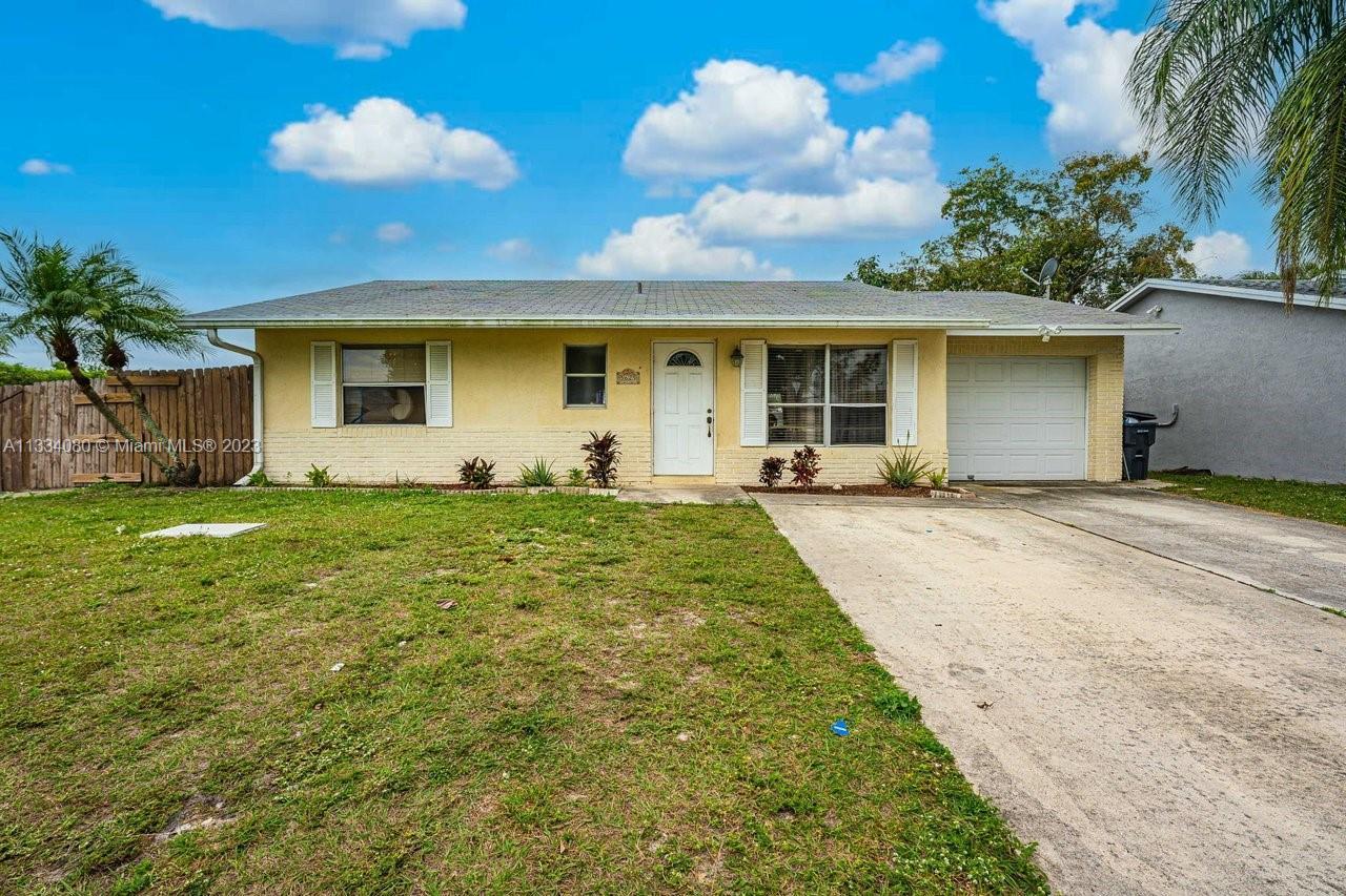 GREAT STARTER HOME! 2 BEDROOM, 2 BATH 1 CAR GARAGE WITH A POOL. IT OFFERS A HUGE FENCED IN YARD, THA