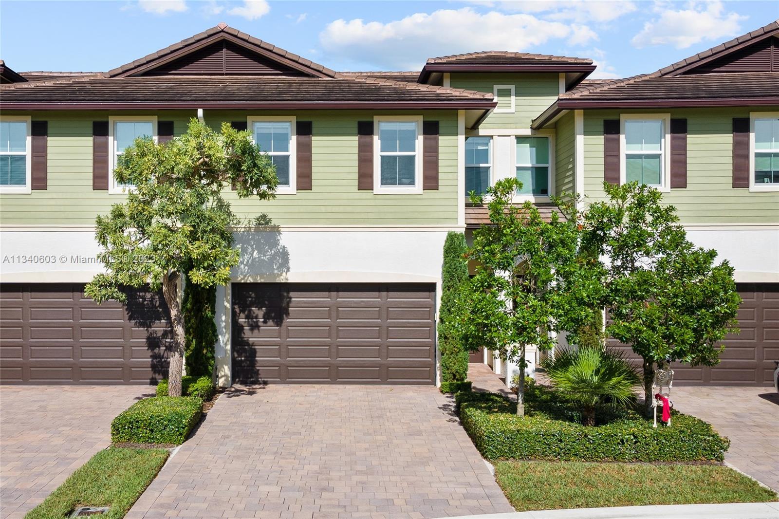 Beautifully decorated home with superior finishes in Pointe 100 - Boca Pointe's most recently built 