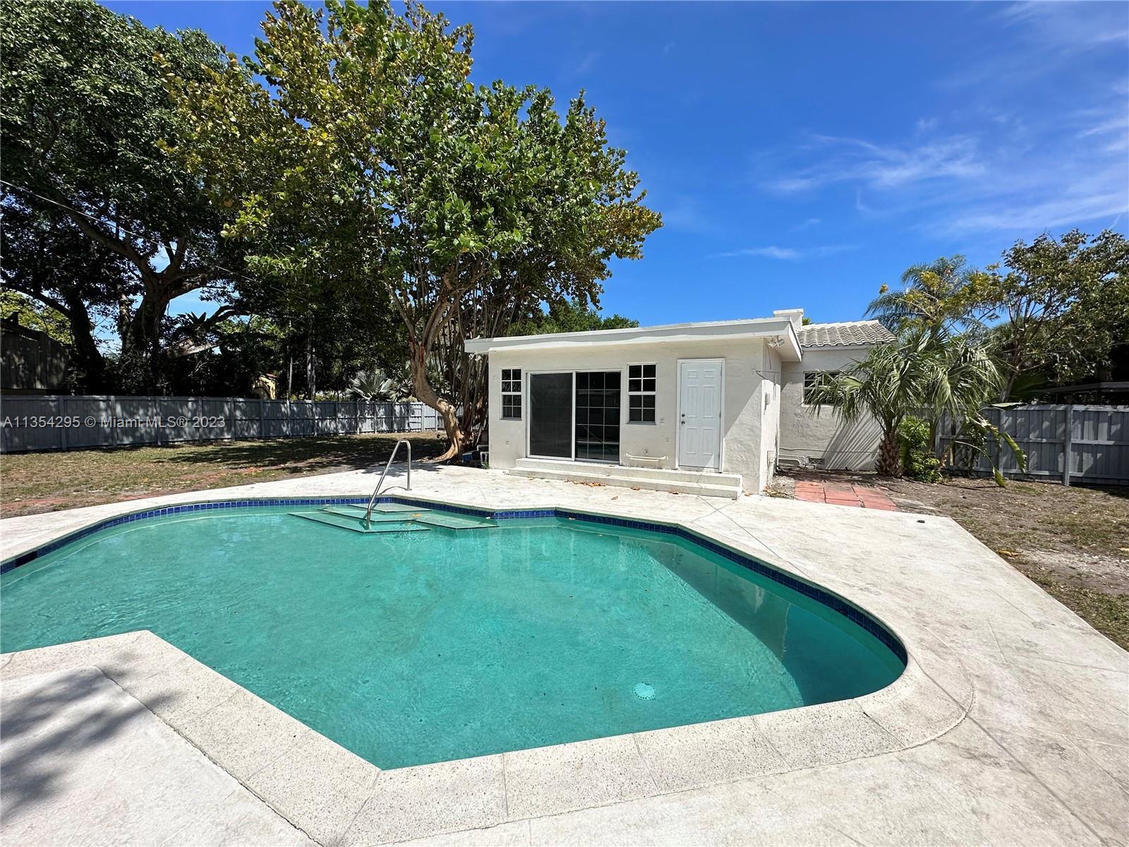 3 bedroom, 2 bath home has a great Pool on an OVERSIZED LOT. IMPACT WINDOWS. Barrel tile roof. Huge 