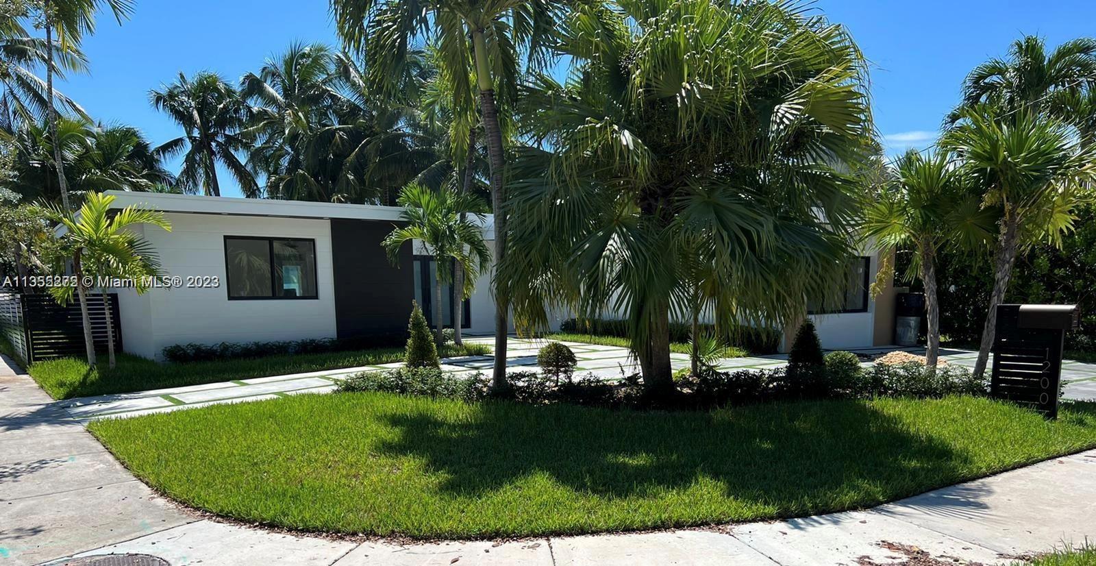 Waterfront home located in Miami Beach's hidden island of Biscayne Point with canal access to the Mi