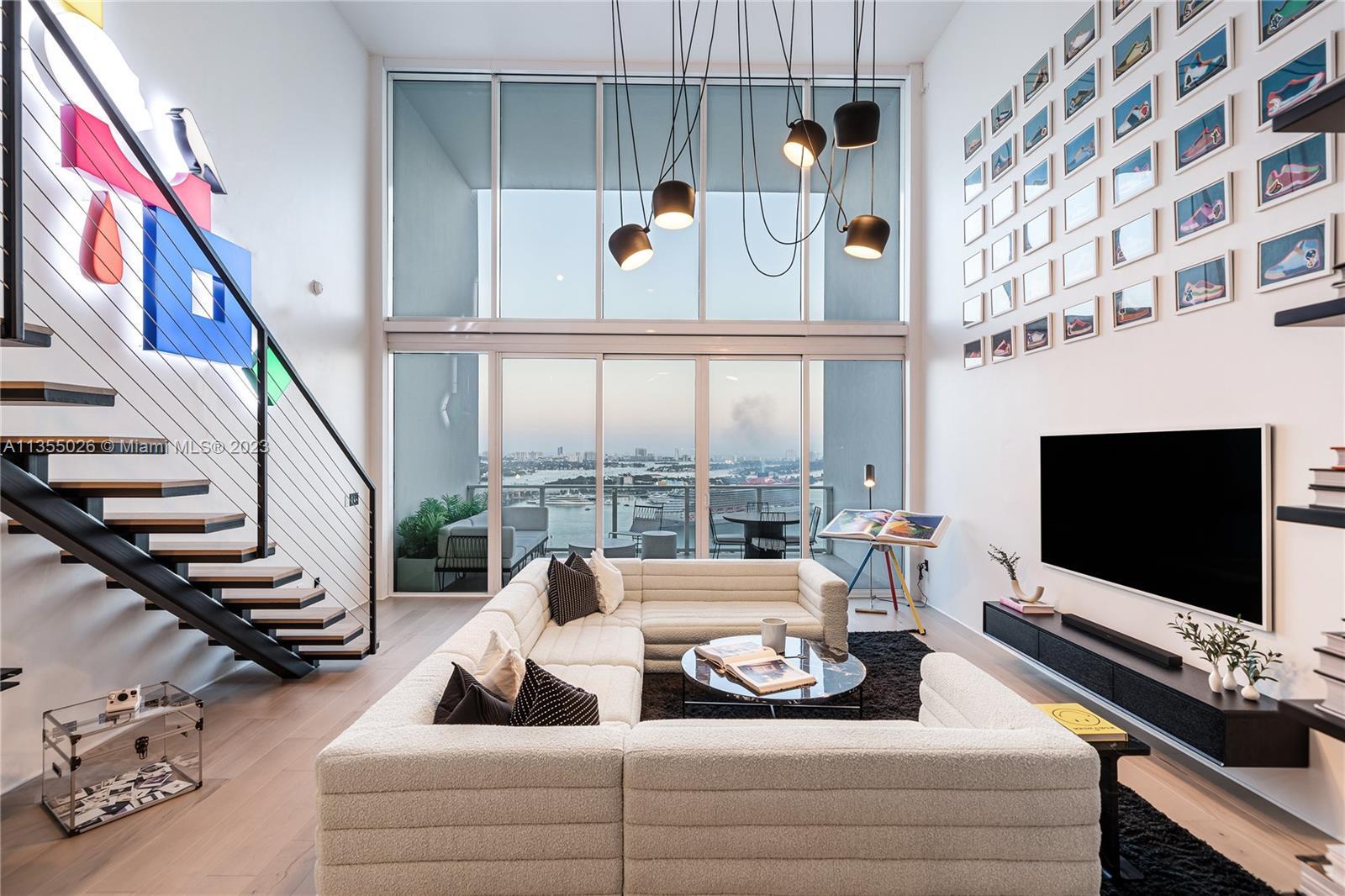 Welcome to No. 2603 at Ten Museum Park by Oppenheim Architecture! This stunning two-story waterfront