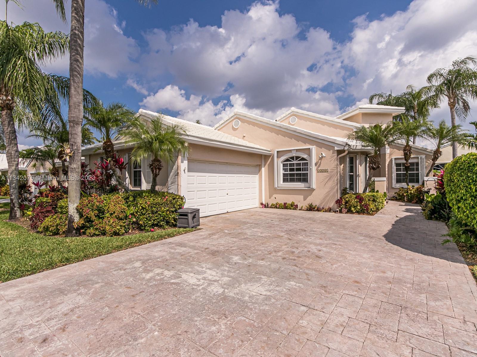 Awesome opportunity to live in beautiful Grand Palms HOA and  Golf Course Community in South Broward