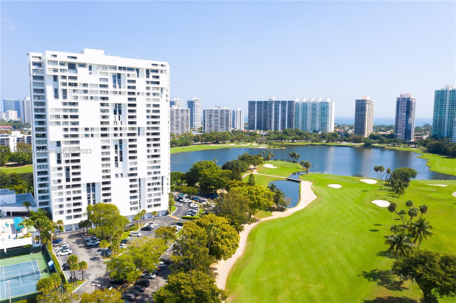 SPECTACULAR GOLF COURSE, INTRACOASTAL, AND PARTIAL OCEAN VIEWS! THIS SPACIOUS AND BRIGHT 2 BEDROOM, 