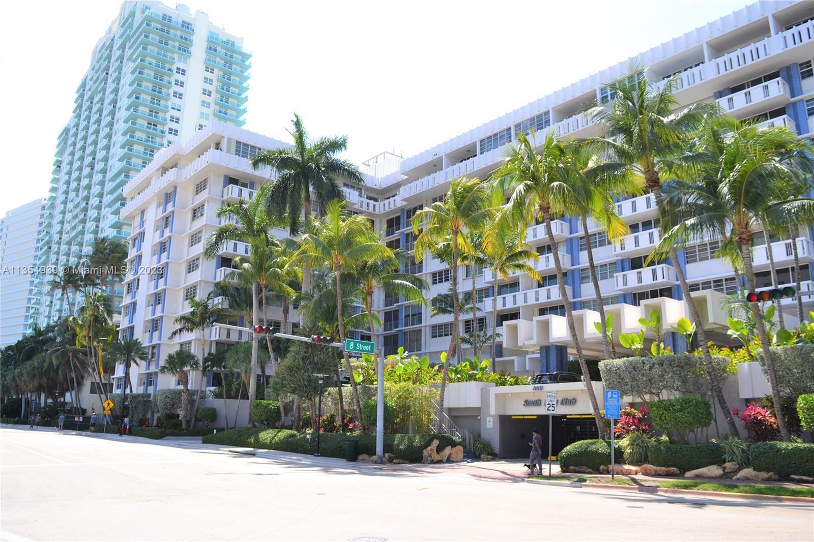 Bright, spacious 1BR with tree-lined Miami Beach view. Floor-to-ceiling sliding glass doors in livin